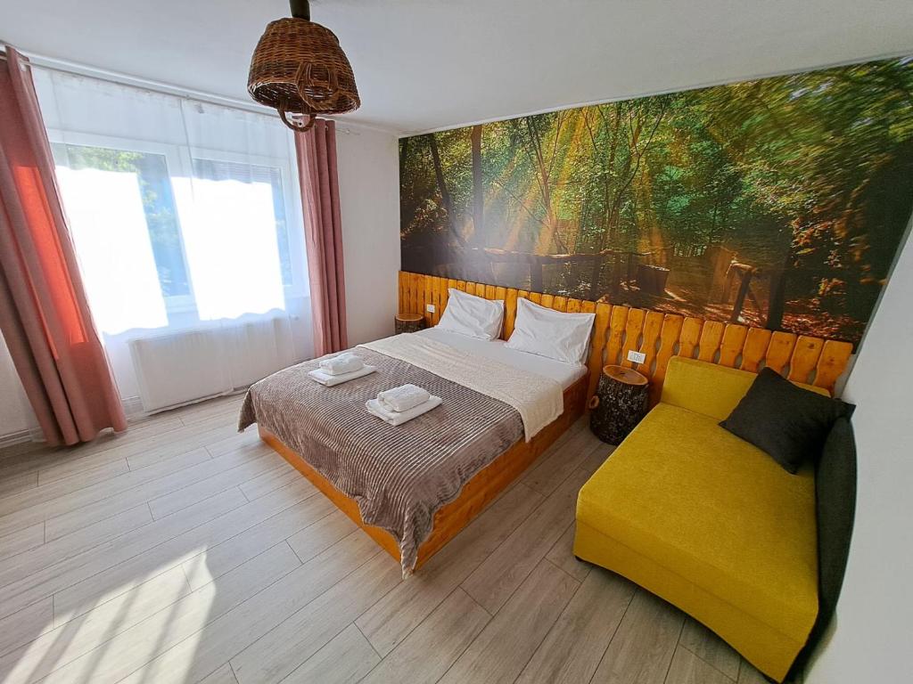 Ένα ή περισσότερα κρεβάτια σε δωμάτιο στο Casa Zina - inchiriere integrala