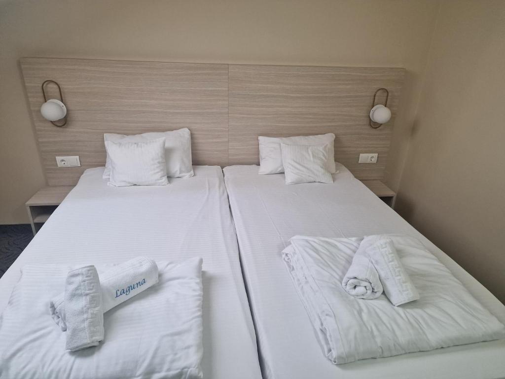 Postel nebo postele na pokoji v ubytování Motel LAGUNA