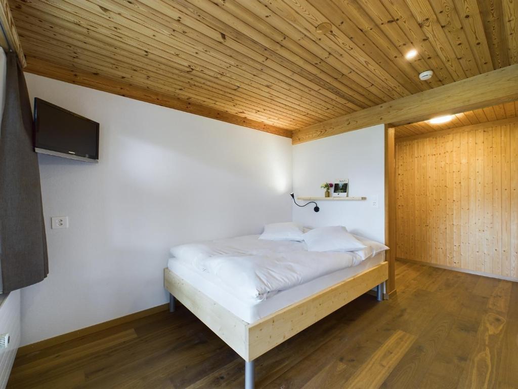 Postel nebo postele na pokoji v ubytování Bergblick Lodge - 3 Sterne Garni - Neueröffnung
