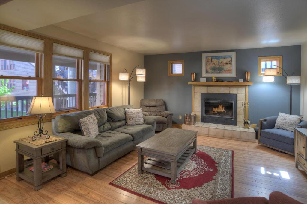 a living room with a couch and a fireplace at 2 2 Ferringway 13 in Durango