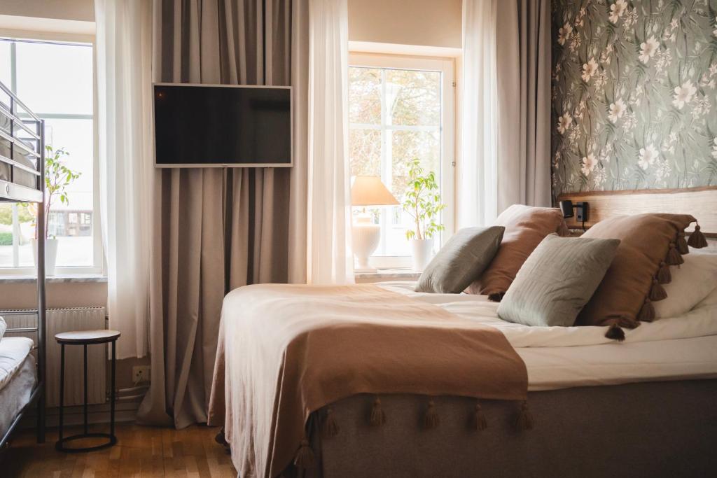 Postel nebo postele na pokoji v ubytování Två Systrar B&B