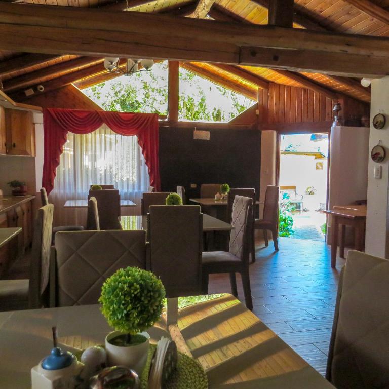 Posezení v ubytování Hosteria Airport Garden