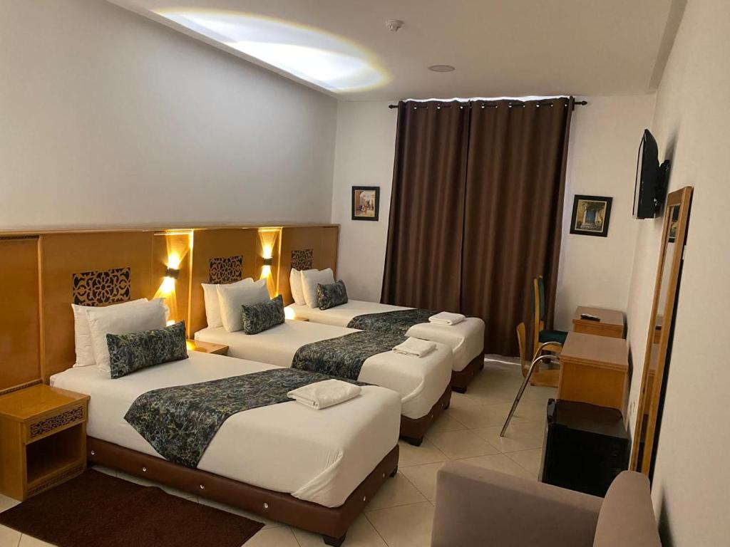 Postel nebo postele na pokoji v ubytování Hotel Miramar