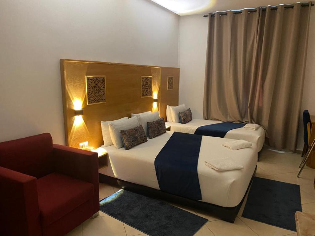 Postel nebo postele na pokoji v ubytování Hotel Miramar