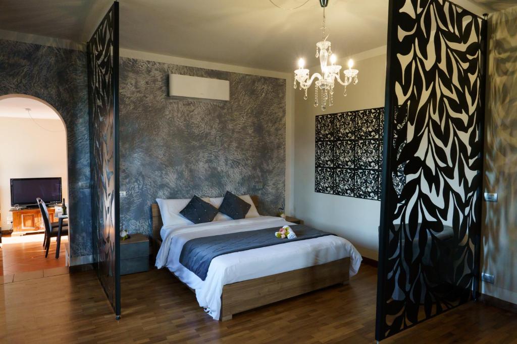 Posteľ alebo postele v izbe v ubytovaní Villa Desideria