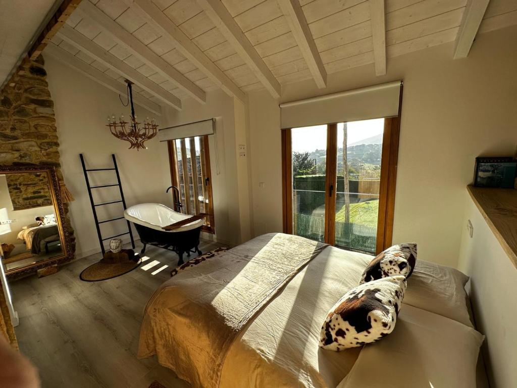 Postel nebo postele na pokoji v ubytování APARTAMENTOS KERCUS