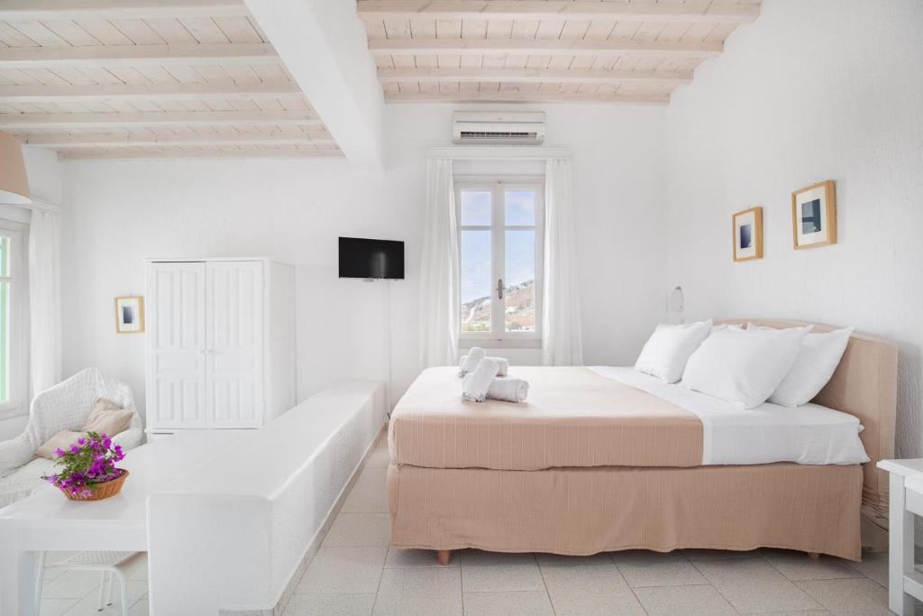 Postel nebo postele na pokoji v ubytování Fos Apartments Mykonos