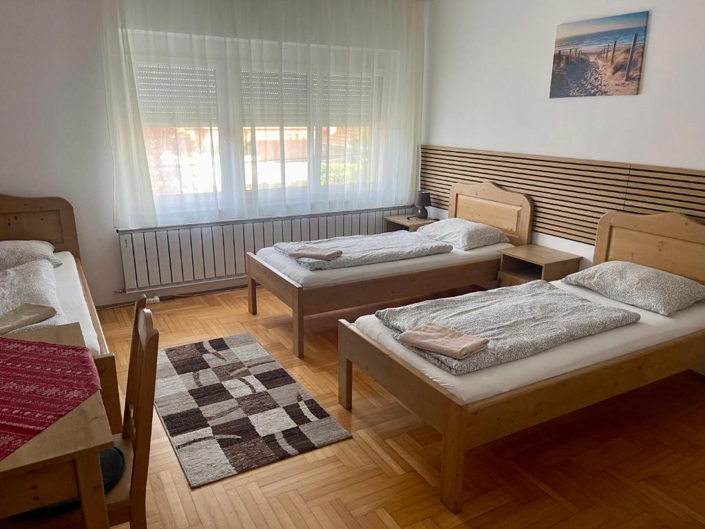 Postel nebo postele na pokoji v ubytování Airport Jazmin Guesthouse