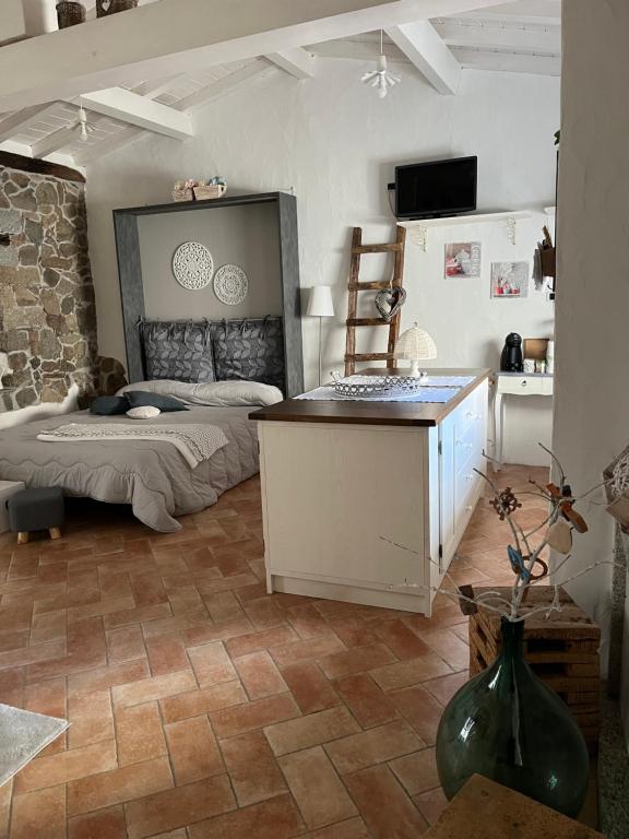 Kuchyň nebo kuchyňský kout v ubytování B&B Roseddu