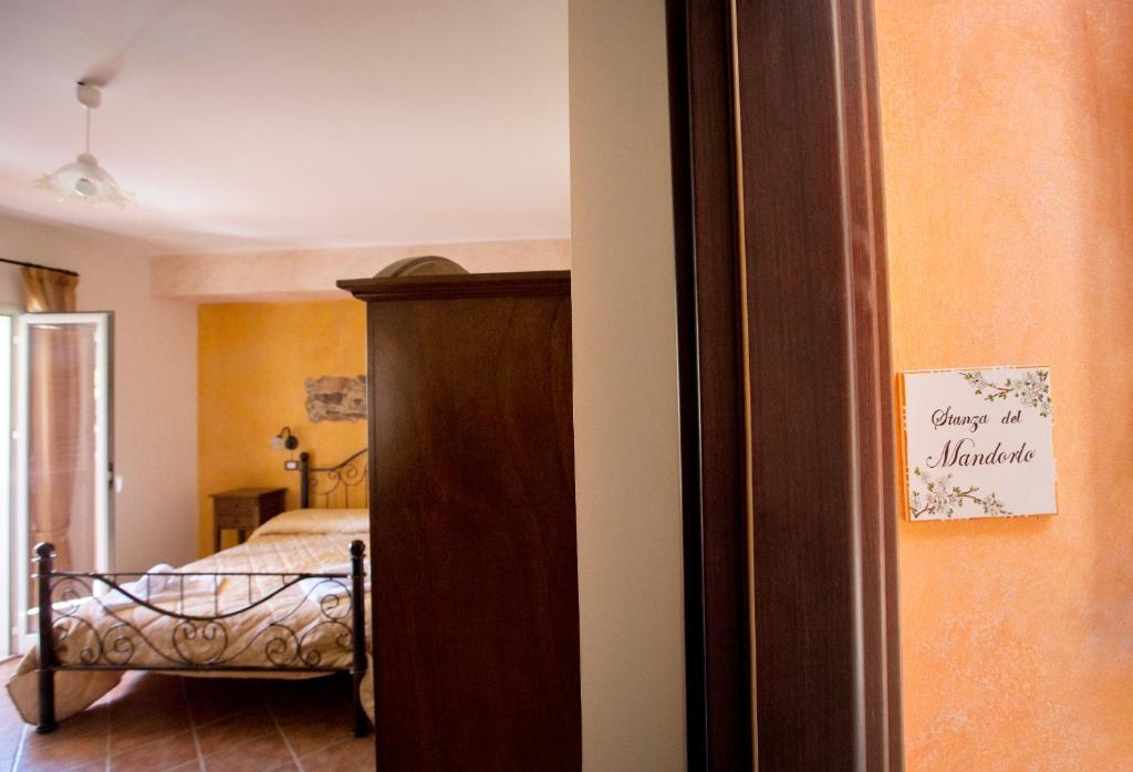 Postel nebo postele na pokoji v ubytování Sikania Suite