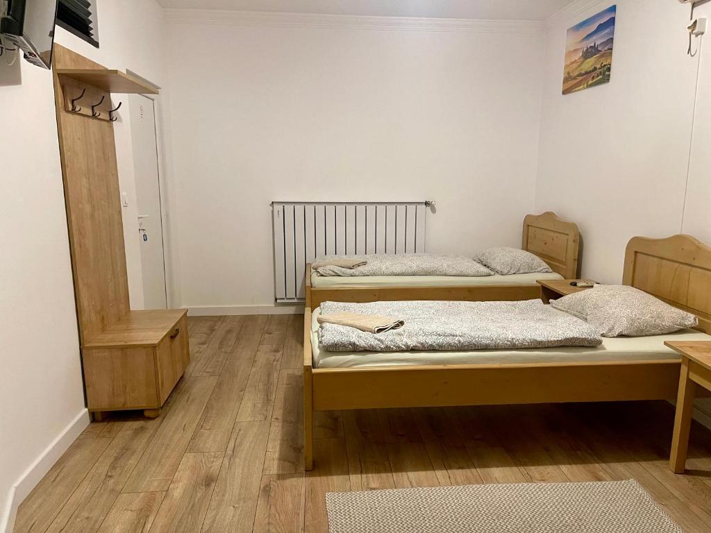 Postel nebo postele na pokoji v ubytování Airport Jazmin Guesthouse