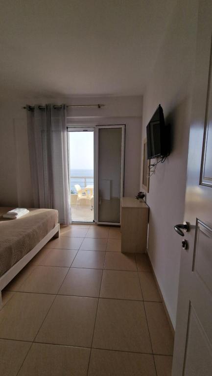 TV i/ili multimedijalni sistem u objektu Horizon view rooms