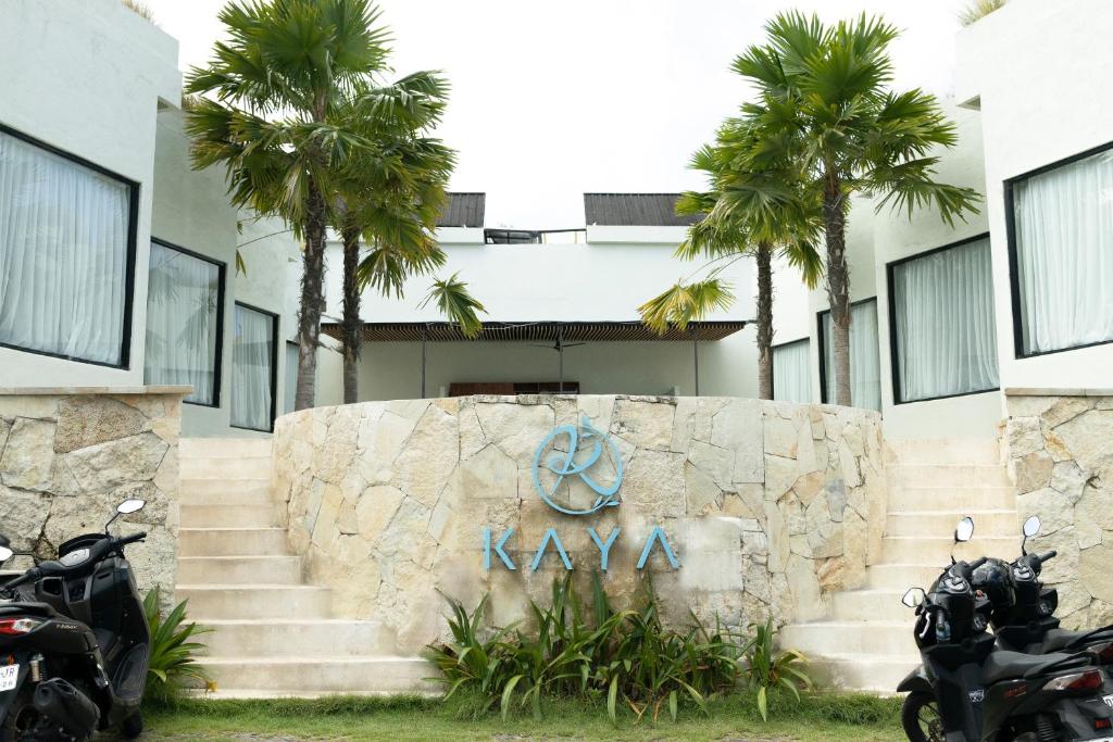 a group of motorcycles parked in front of a building at KAYA Uluwatu in Uluwatu