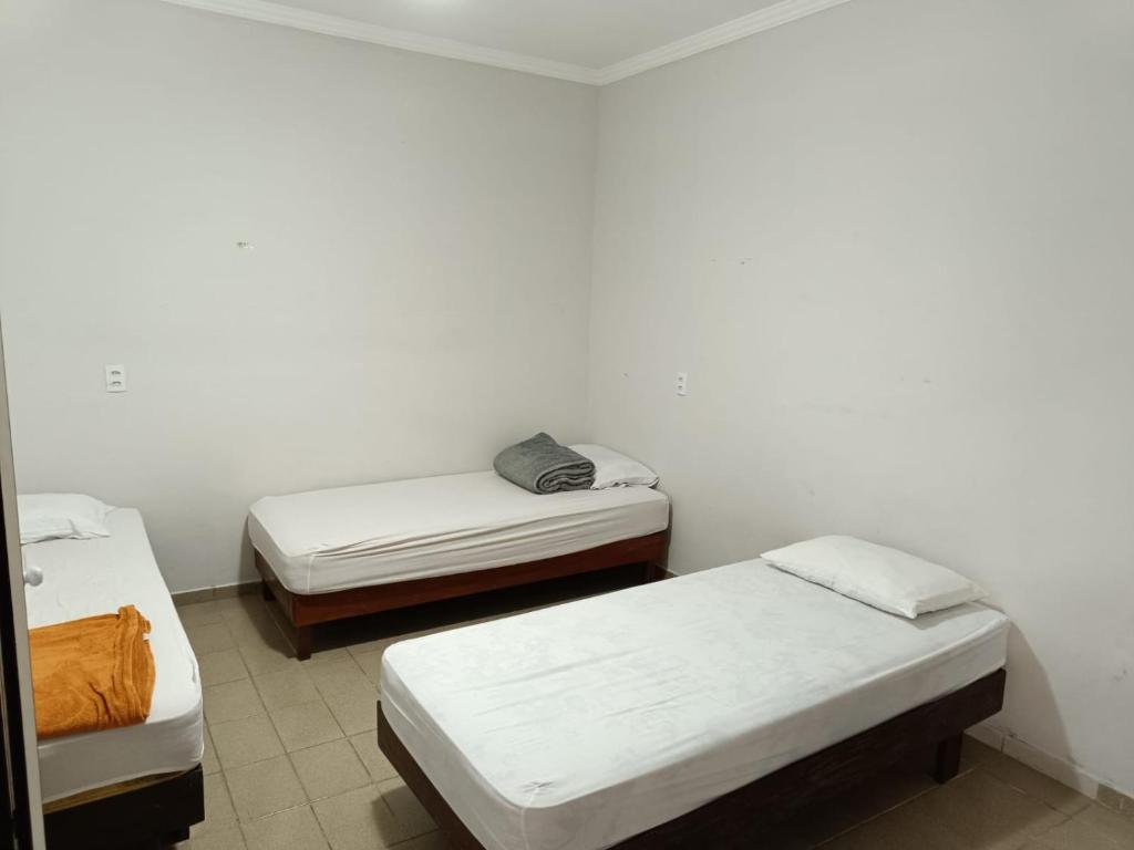 Postel nebo postele na pokoji v ubytování Hostel Diniz