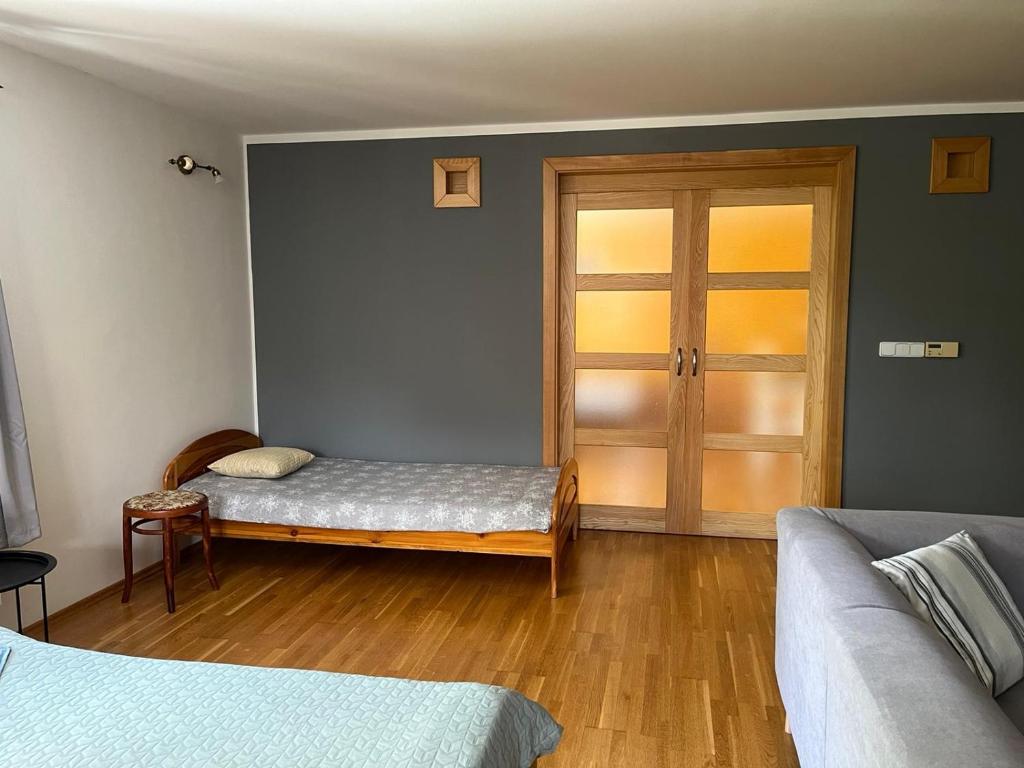 Postel nebo postele na pokoji v ubytování Apartmán Pod Klášterem
