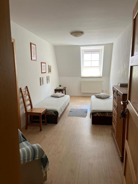 Postel nebo postele na pokoji v ubytování Apartmán Pod Klášterem