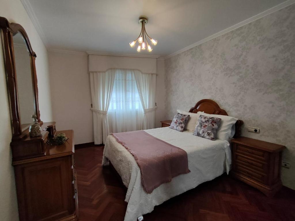Posteľ alebo postele v izbe v ubytovaní Apartamento Xanela o Mar