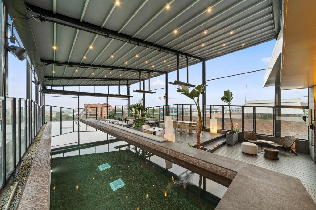 a view of a building with a pool of water at BOG Hotel in Bogotá