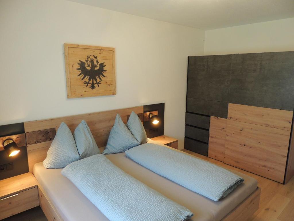Postel nebo postele na pokoji v ubytování Bacher´s Home am Sonnenplateau