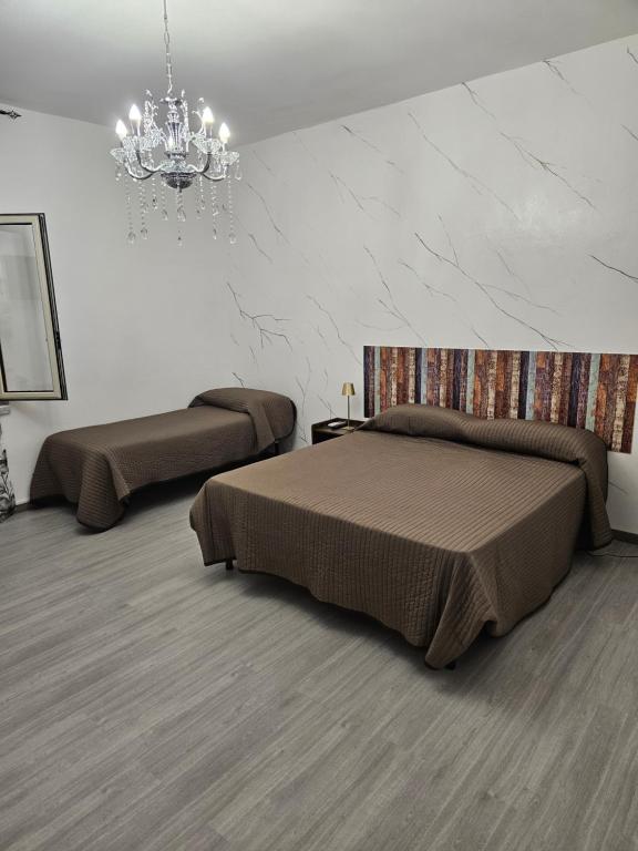 Postel nebo postele na pokoji v ubytování B&B IL Pistacchio