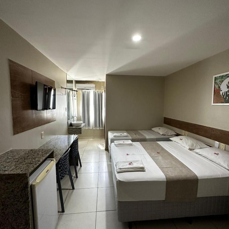 Postel nebo postele na pokoji v ubytování Onix Hotel Aeroporto