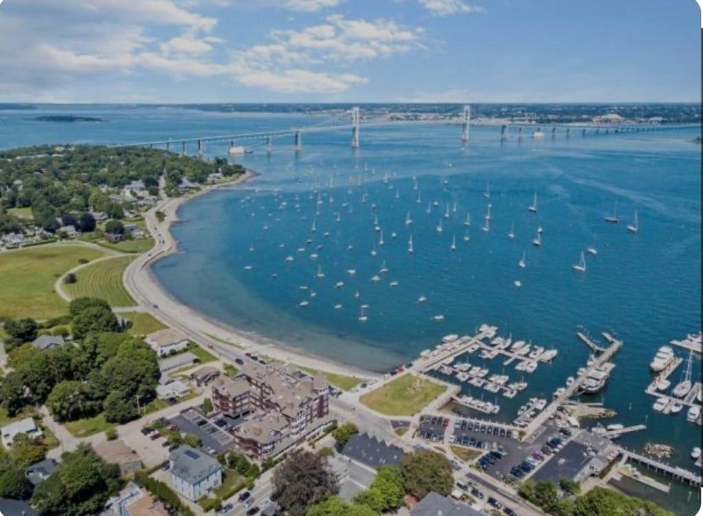 an aerial view of a harbor with boats in the water at Ocean View The Newport Overlook Two BR House Jamestown Across from Newport RI in Jamestown