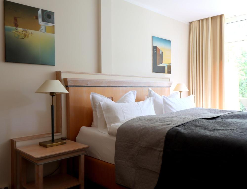 Ένα ή περισσότερα κρεβάτια σε δωμάτιο στο Strandappartement Fischland 123