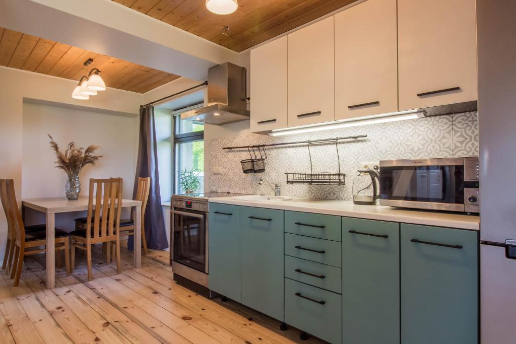 Kuchyň nebo kuchyňský kout v ubytování Vellavere Guest House