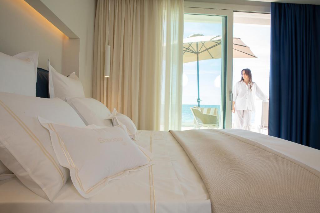 Postel nebo postele na pokoji v ubytování Scirocco Boutique Eco Hotel