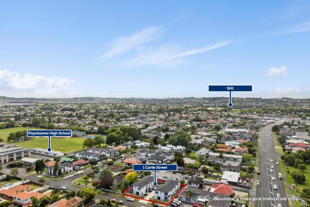 an overhead view of a city with street signs at Holiday Home or Short term Rental in Papatoetoe in Auckland