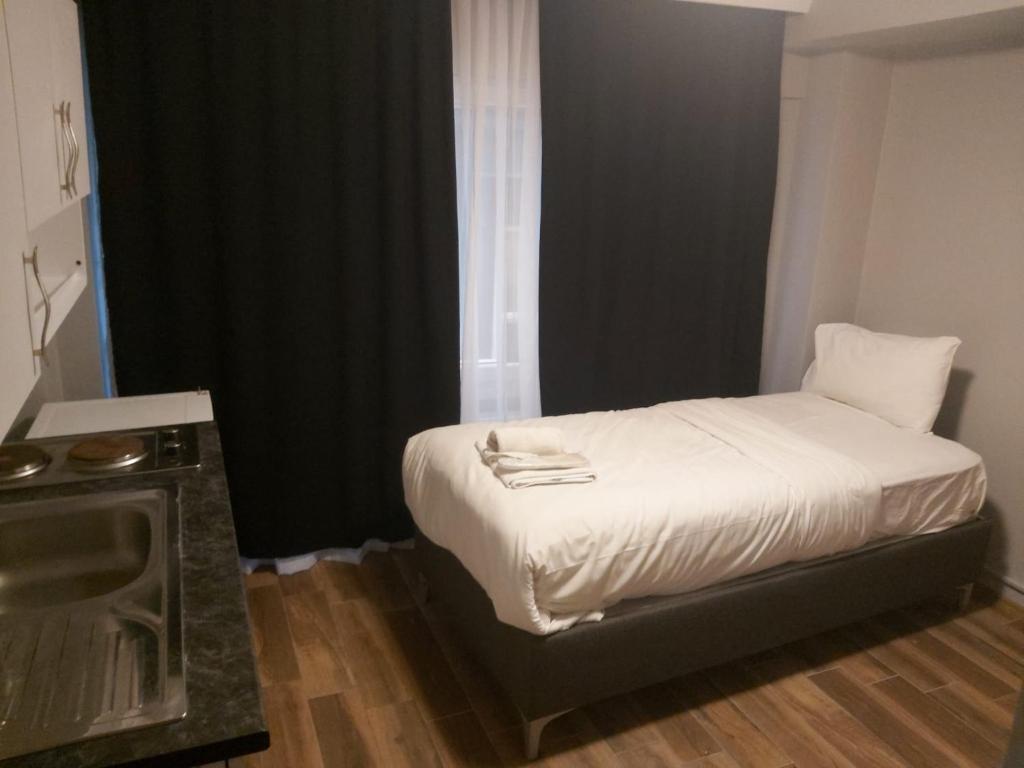 Postel nebo postele na pokoji v ubytování Rodos HAN