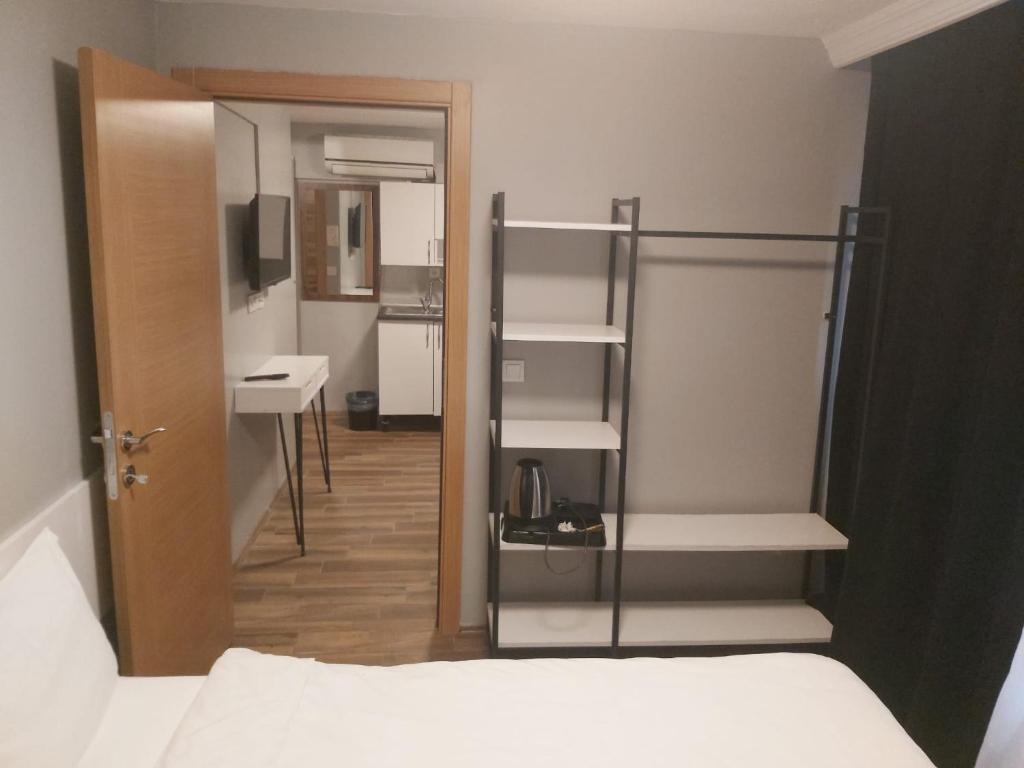 Postel nebo postele na pokoji v ubytování Rodos HAN