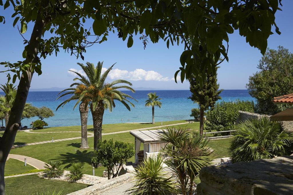 a view of the ocean from a resort at Afitis Boutique Hotel in Afitos