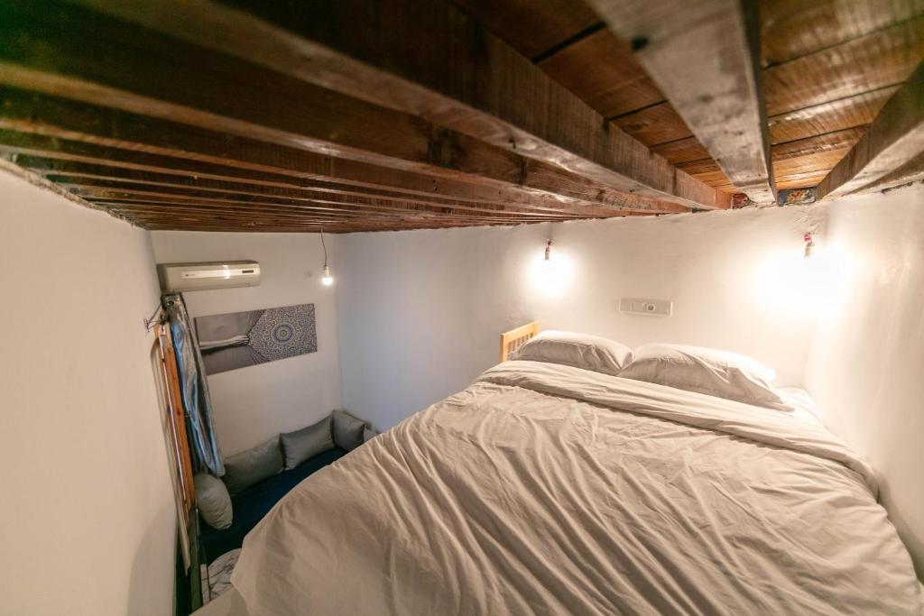 Postel nebo postele na pokoji v ubytování Casa Omaima
