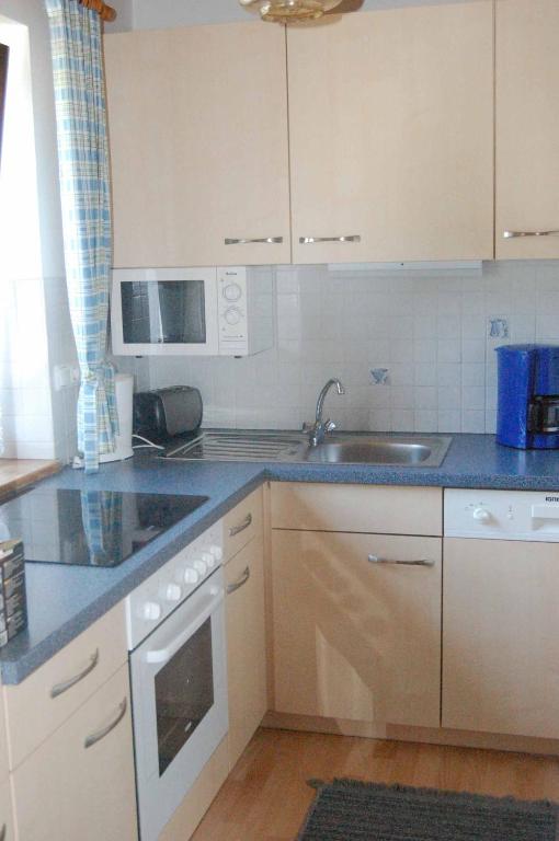 Kuchyň nebo kuchyňský kout v ubytování Ferienhaus Elisabeth