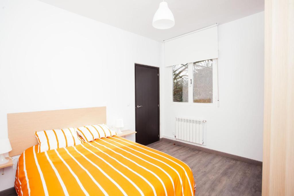 Posteľ alebo postele v izbe v ubytovaní Apartamentos Florida 30