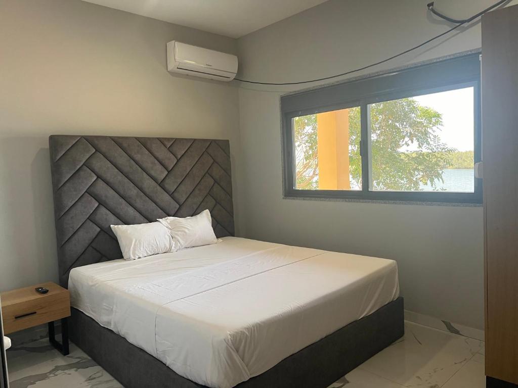 Un pat sau paturi într-o cameră la Canafistra Prestige Villa