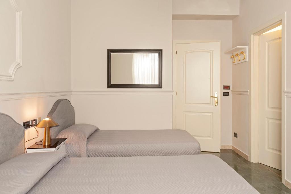 Voodi või voodid majutusasutuse The Port Residence toas