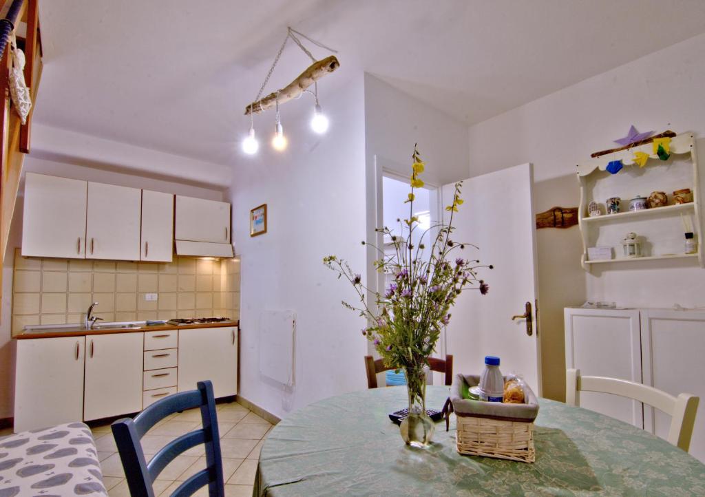 Kuchyň nebo kuchyňský kout v ubytování Casa Gabriella
