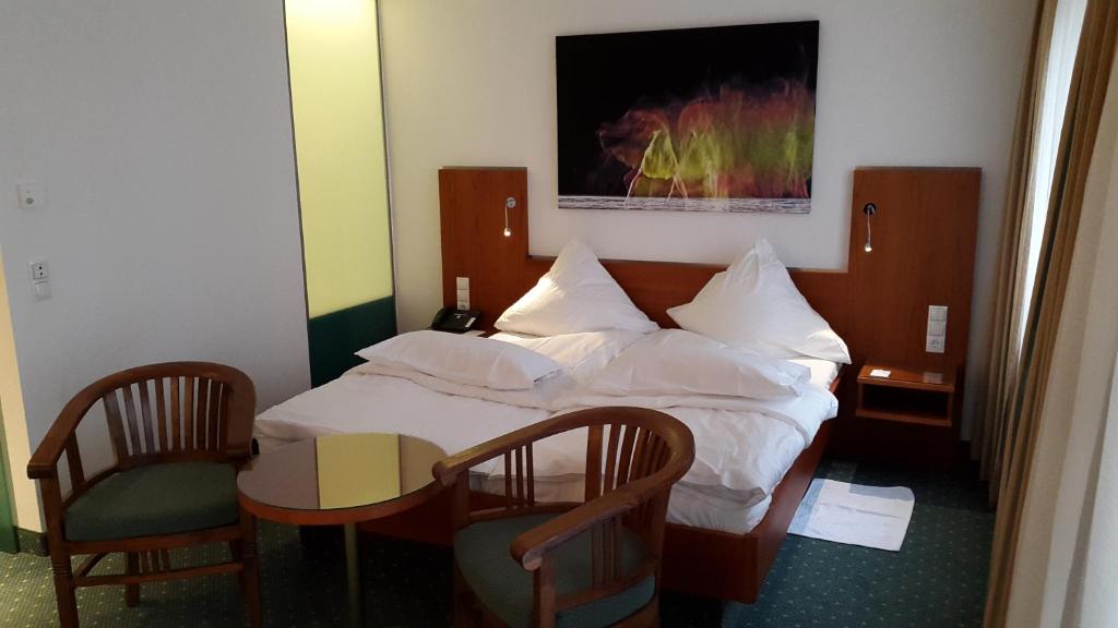 Krevet ili kreveti u jedinici u okviru objekta Hotel Unger