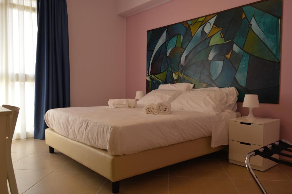 Posteľ alebo postele v izbe v ubytovaní B&b Bagheria