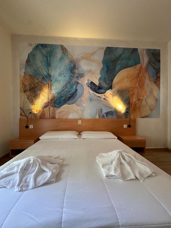 Postel nebo postele na pokoji v ubytování LA MAISON by Hotel Aldebaran