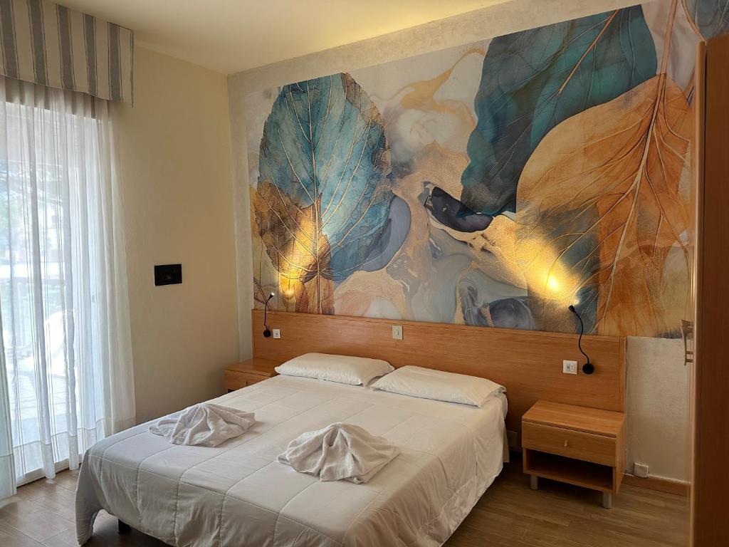 Postel nebo postele na pokoji v ubytování LA MAISON by Hotel Aldebaran
