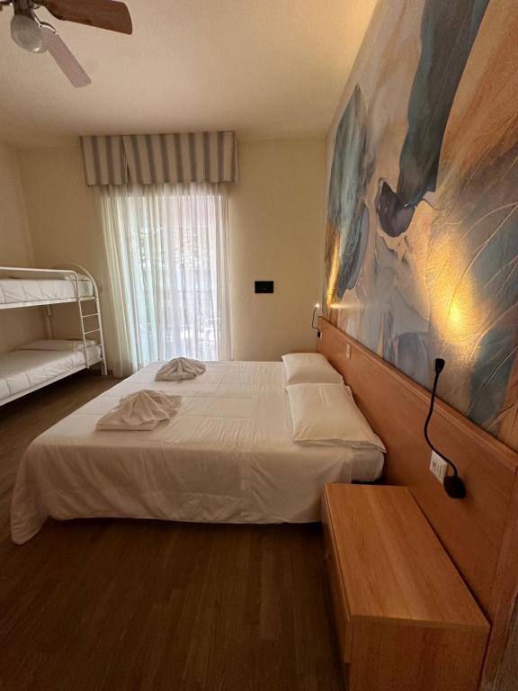 Postel nebo postele na pokoji v ubytování LA MAISON by Hotel Aldebaran