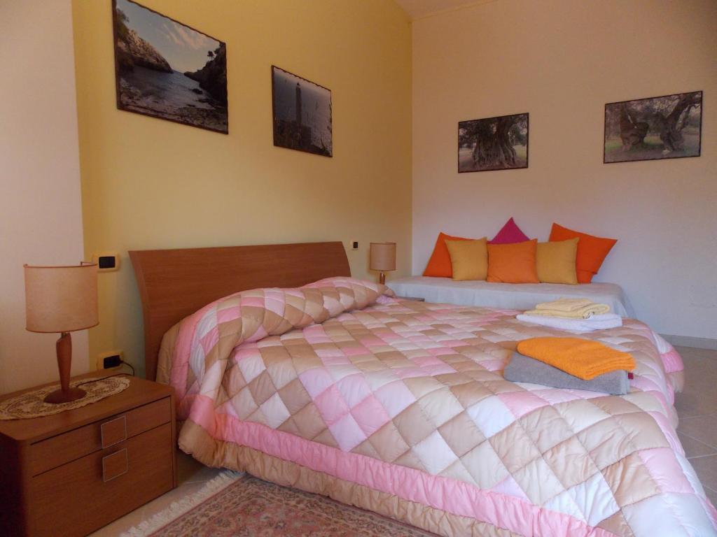 Łóżko lub łóżka w pokoju w obiekcie B&B Soli D'oro