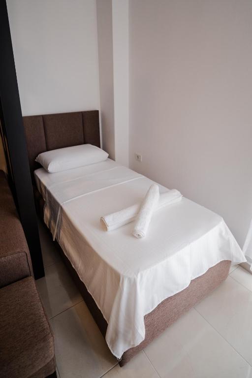 Postel nebo postele na pokoji v ubytování FUYA Apartments