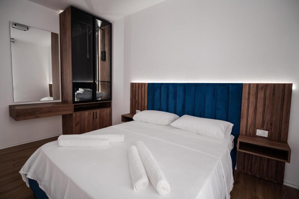 Postel nebo postele na pokoji v ubytování FUYA Apartments
