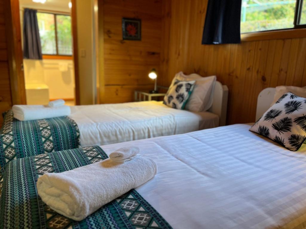 Postel nebo postele na pokoji v ubytování Diamond Roost