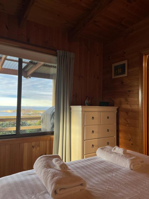 Postel nebo postele na pokoji v ubytování Diamond Roost