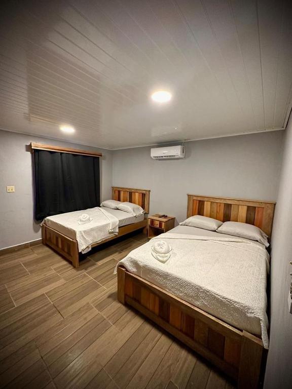 Postel nebo postele na pokoji v ubytování Blasina Beer Hostel